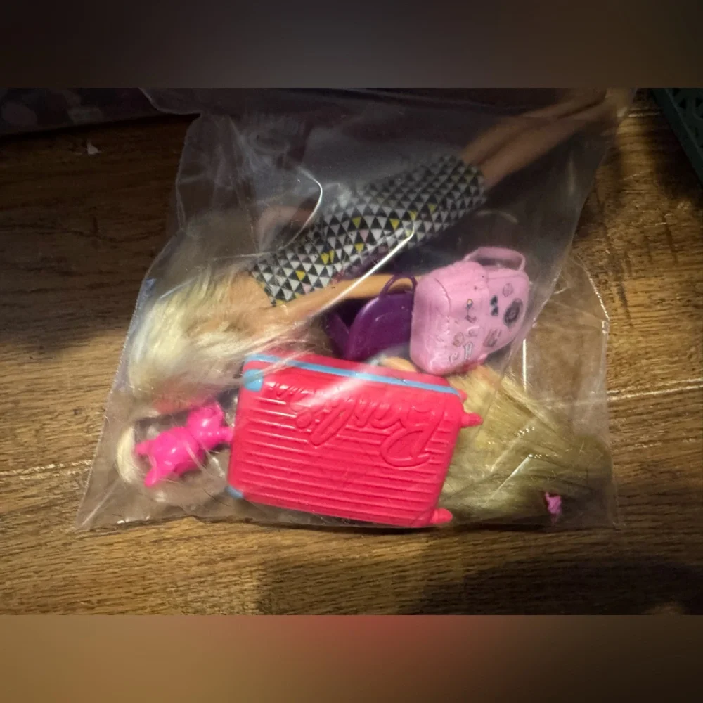 Barbie includes her